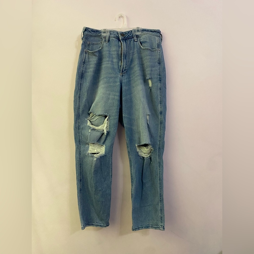 high rise mom jeans, fraying details, rips at the knees